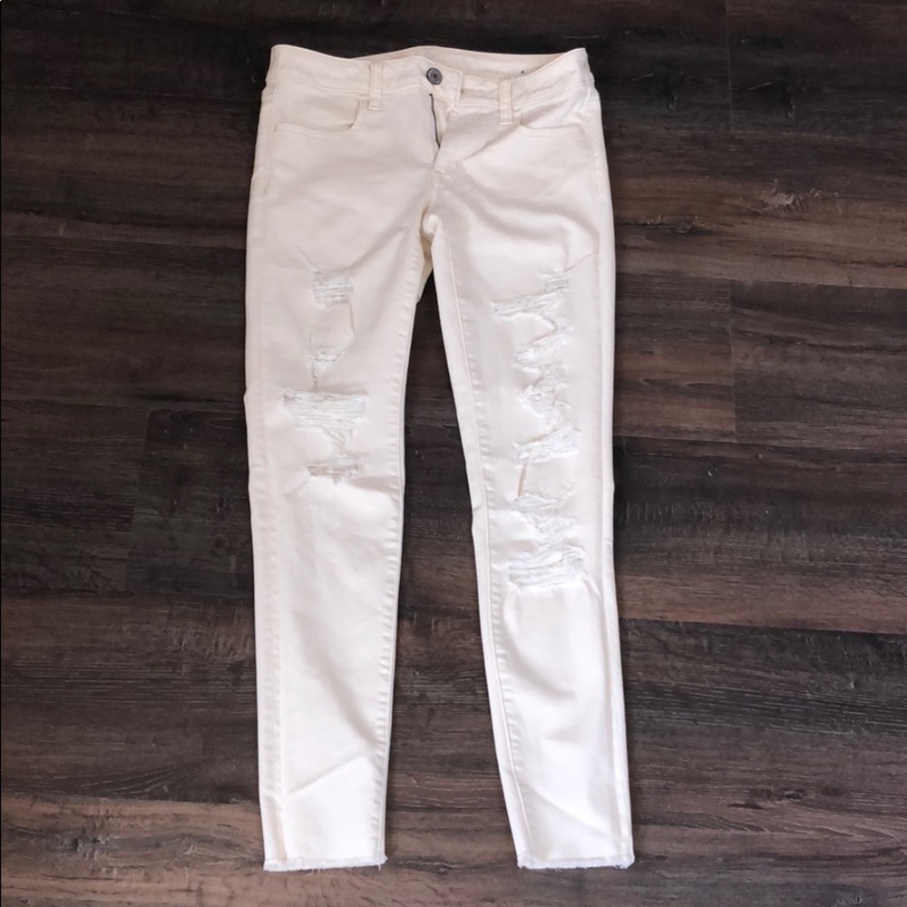 Cream ripped jeans!!